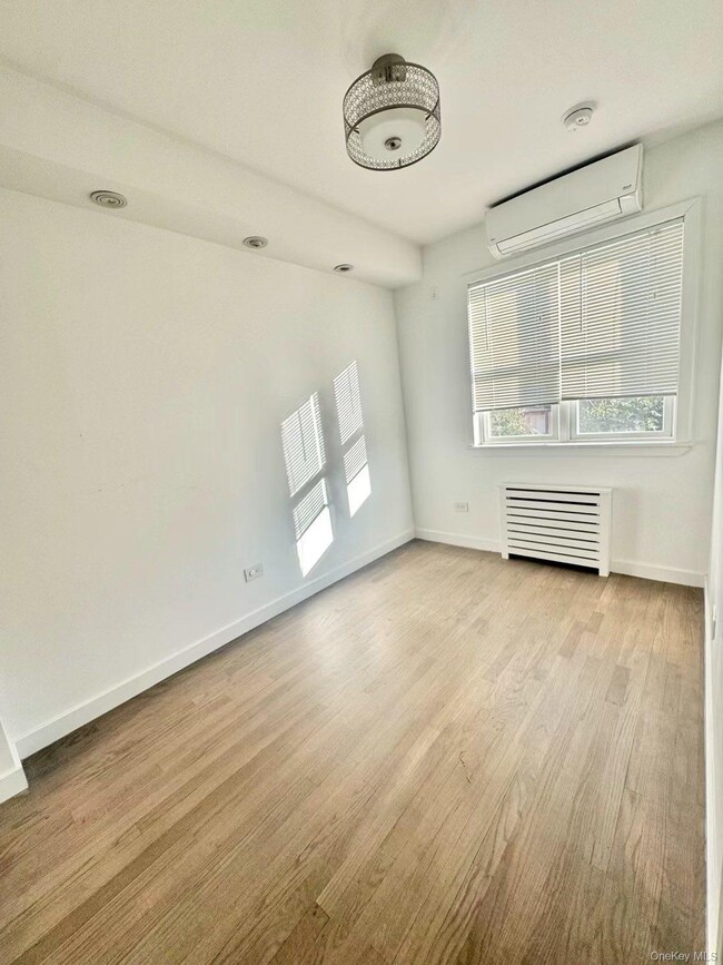 Building Photo - 191-04 39th Ave