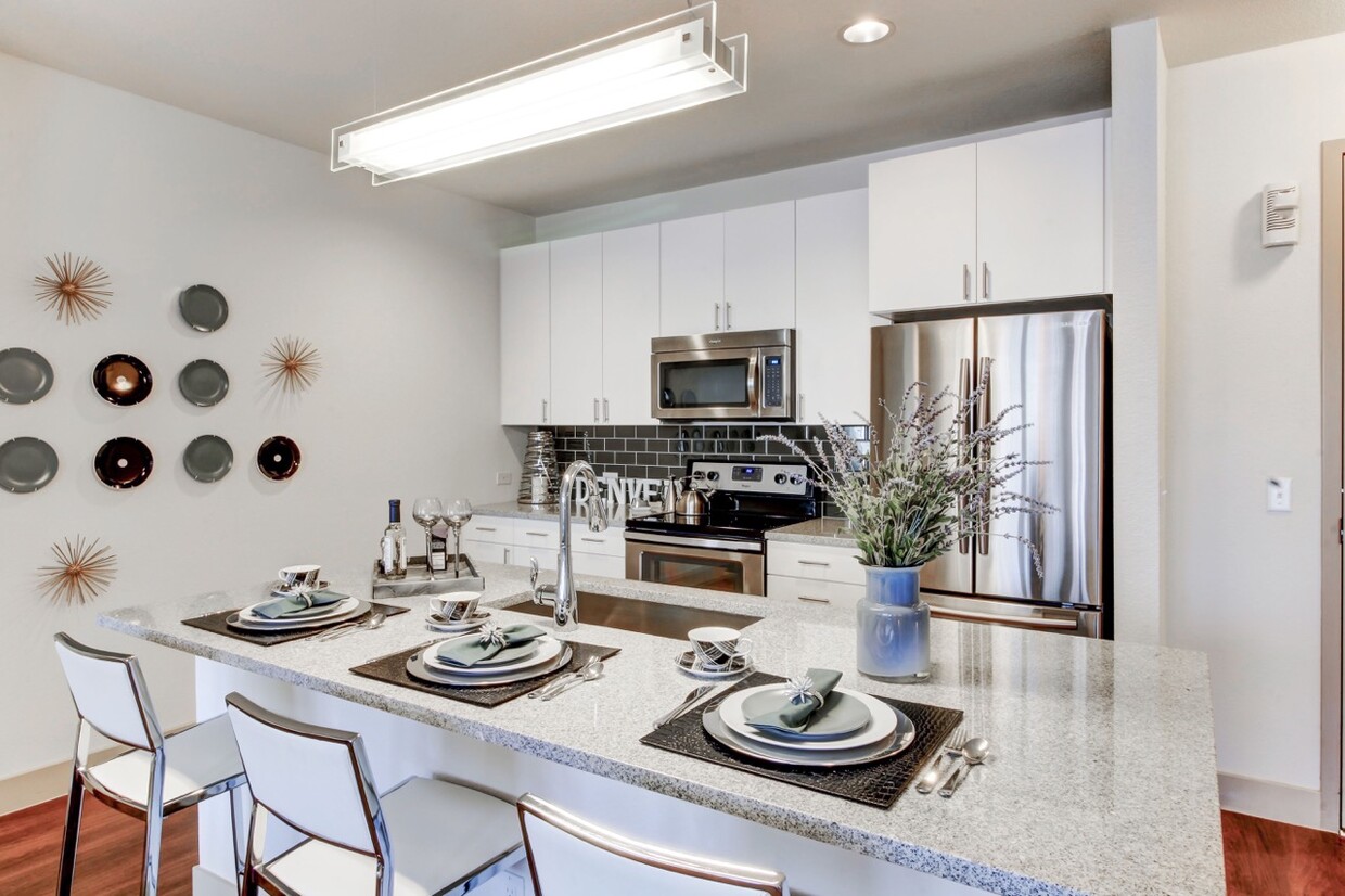 Classic model home kitchen. - Griffis at Fiddler's Green