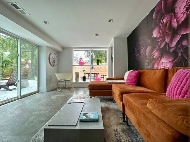 Bright and cosy living space looking out onto the pool deck and yard - 525 S 5th St