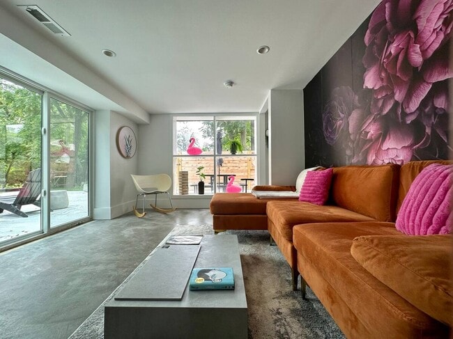 Bright and cosy living space looking out onto the pool deck and yard - 525 S 5th St