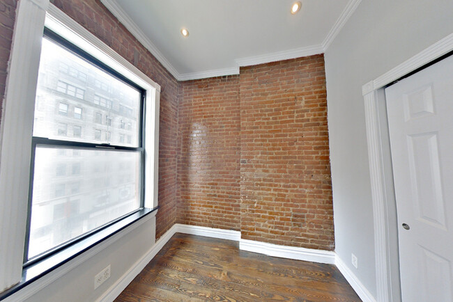 Foto del edificio - 221 E 23rd St