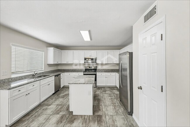 Foto del edificio - 11173 W Madeline Christian Ave