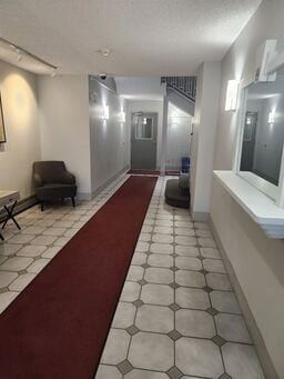 Building Photo - Loft-Style Condo with 2 Bedrooms – Availab...