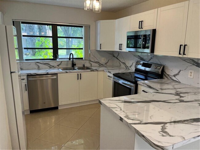 Photo - 700 SW 89th Ave Townhome