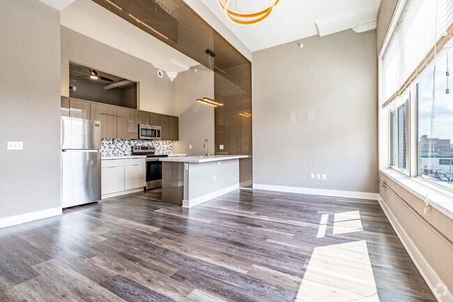 2BR, 1BA - 938SF - Living Room - The Huffman at The Fire Blocks District