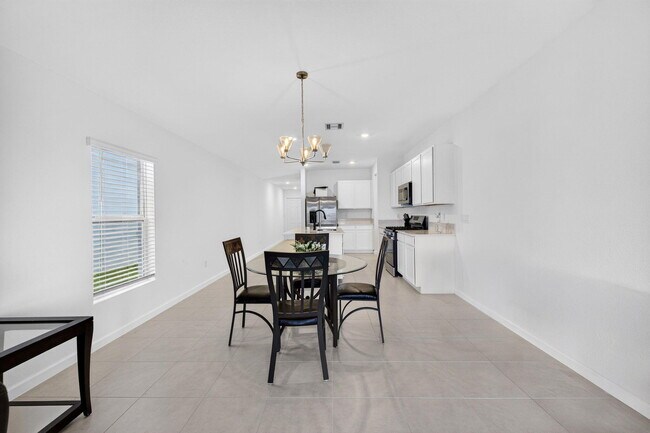 Foto del edificio - 5876 NW Sweetwood Dr