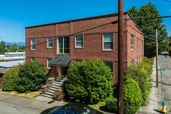 Charming brick exterior with secure controlled access entry - Julia Manor