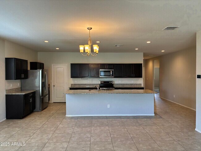 Building Photo - 25698 W Desert Dr