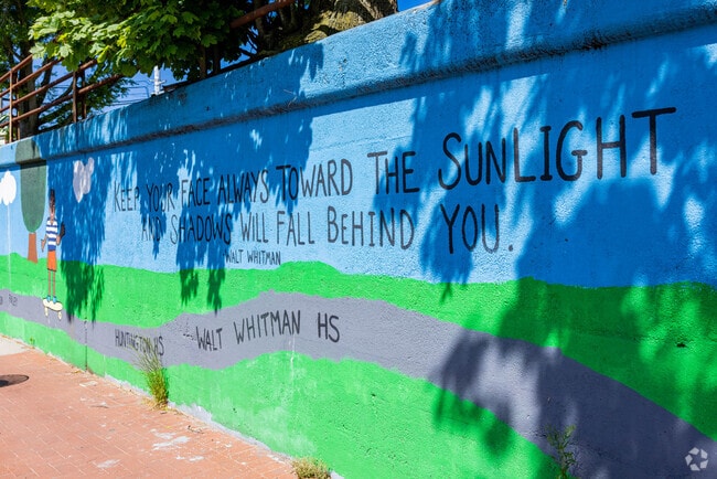 Walt Whitman left his mark on Huntington Station.