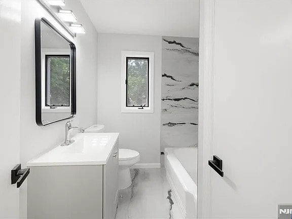 Building Photo - Discover this beautifully updated Cape Cod...