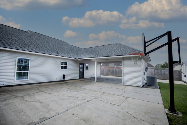 Covered parking with detached storage shed - 11284 Shelly St