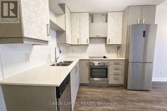 Photo du bâtiment - 28 Uptown Dr