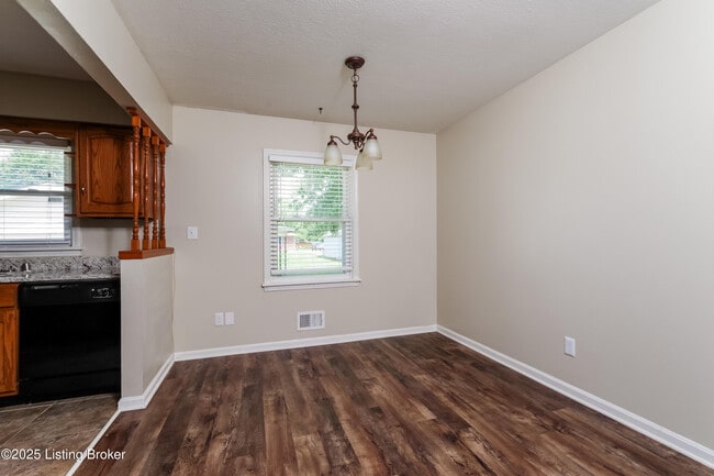 Building Photo - 8003 Canna Dr