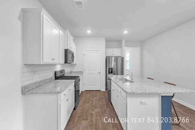 Foto del edificio - 212 Sweet Cherry Ln