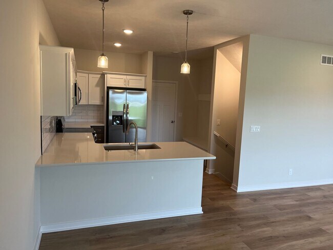 Foto del edificio - Spacious 5-Bedroom Duplex Near Asbury Elementary with Finished Basement & Full Amenities