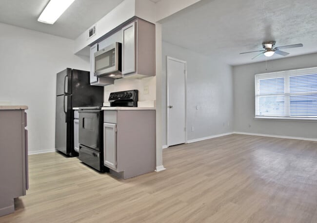 Modern Kitchen – Updated kitchen with appliances at The Adelaide Apartments - Adelaide