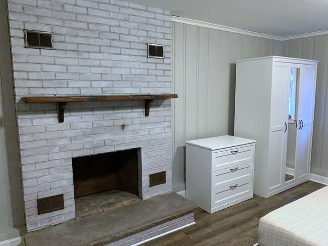 Fireplace, dresser, and armoire - 8 Dorchester Rd