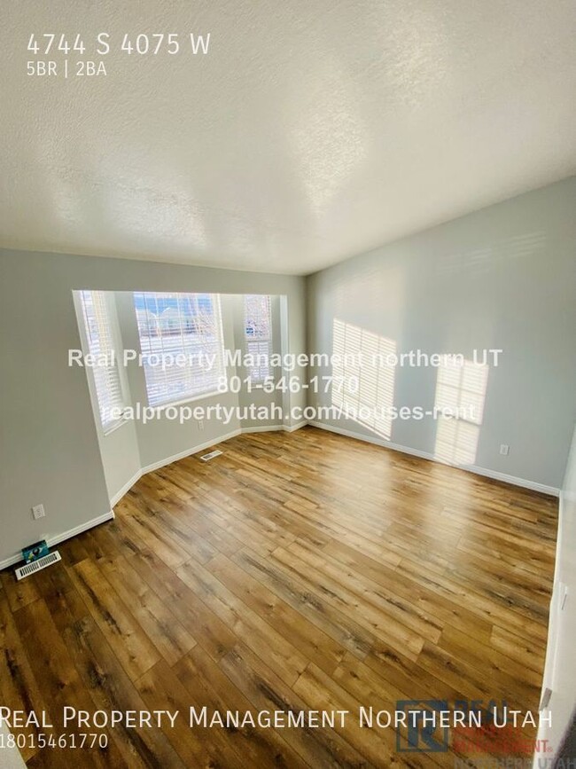 Building Photo - Renovated 5-Bed Roy Home!