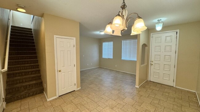 Building Photo - Gated 3 BDRM Master BDRM downstairs