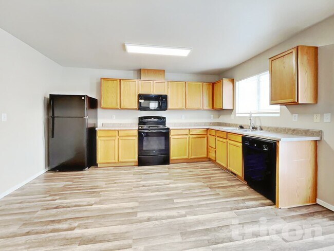 Foto del edificio - 8818 Sunset Breeze Dr