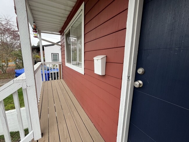 Building Photo - Charming 2-Bedroom Home with Hardwood Floors, Bright Living Spaces & Large Fenced Yard