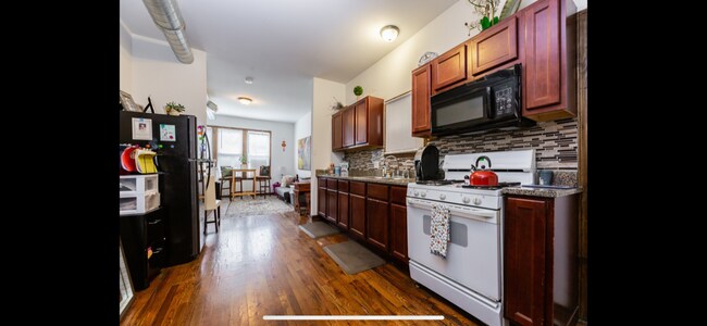 Building Photo - 4510 S Lowe Ave