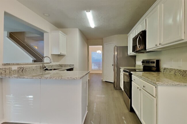 Foto del edificio - 18114 Stone Trail Manor Dr