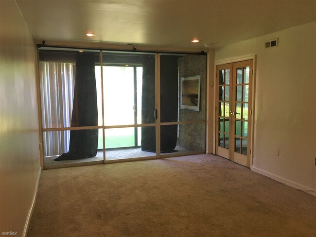 Building Photo - 1 br, 1.5 bath  - 8647 Greenbelt Rd Apt T2