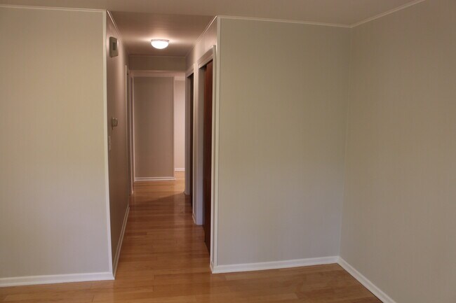 main hall from living room toward laundry - 122 N Sunset Dr