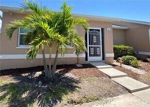 Building Photo - 16841 Sanibel Sunset Ct