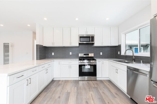 Building Photo - 3872 Bentley Ave