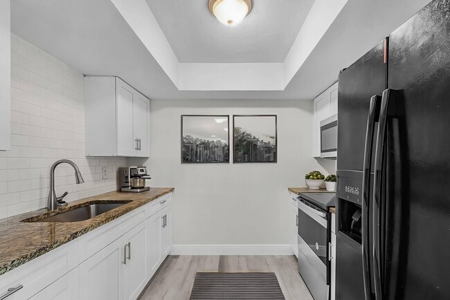 Building Photo - Paradise Palms Portfolio LLC