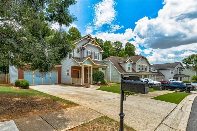 Building Photo - Welcome to this stunning 4-bedroom, 2.5-ba...