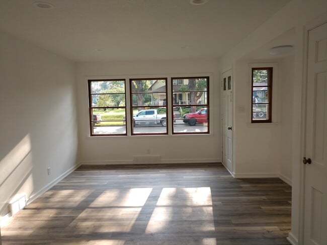 Living room looking out - 209 SW School St
