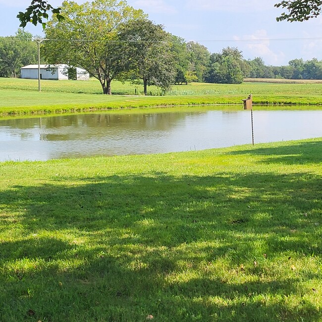 Semi country setting with a fishing pond - 10578 Khoury League Rd