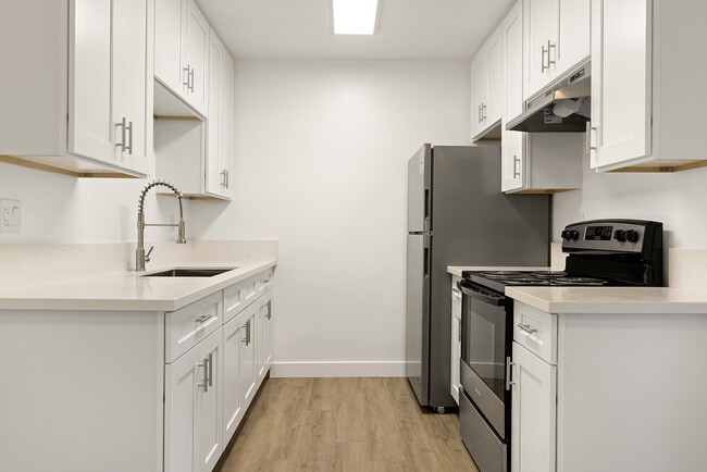 Crea comidas y recuerdos en tu cocina moderna. - View Apartments