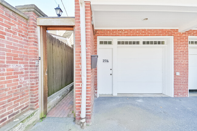 Parking space, garage mudroom, secure entrance - 206 E Marion St