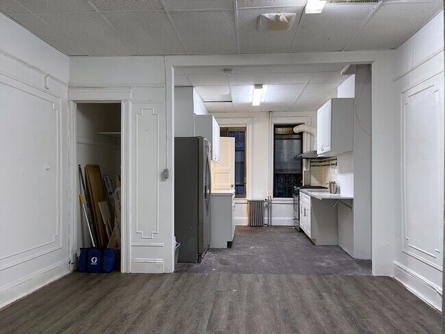 View of kitchen and coat closet from living room - 1681 Gates Ave