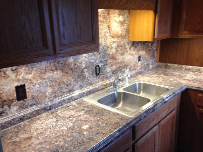 Kitchen sink and cabinets - 924 E Main St