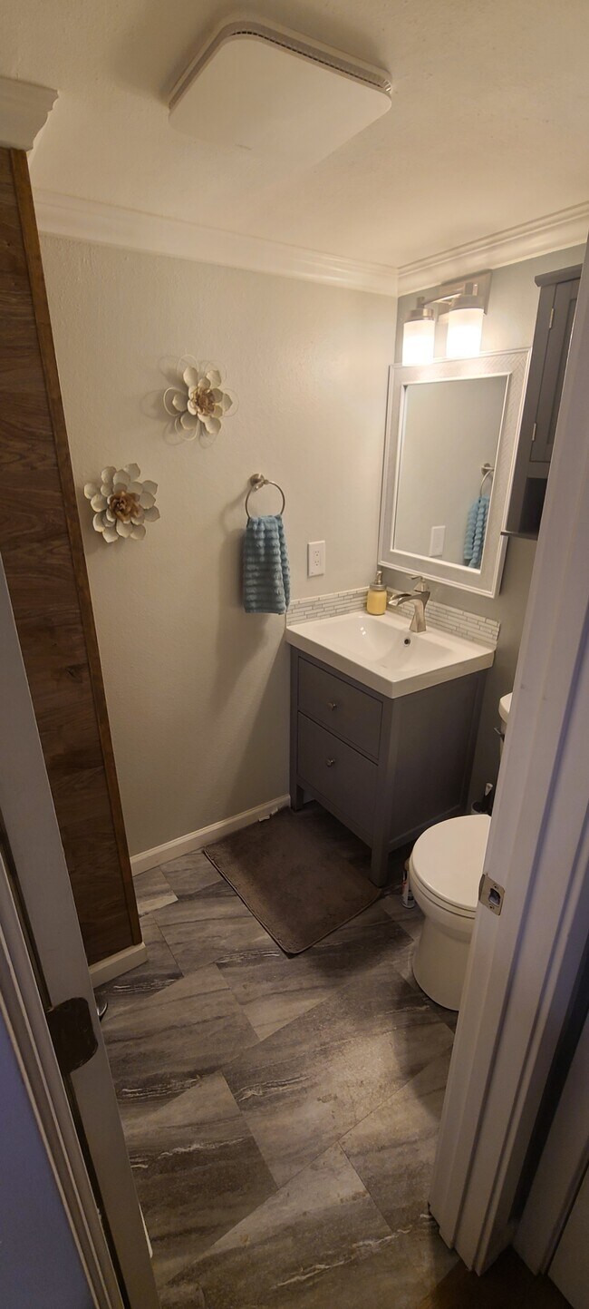 The half bath downstairs - 2311 Stepping Stones Way