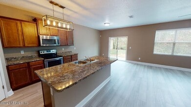 Building Photo - 65061 Lagoon Forest Dr