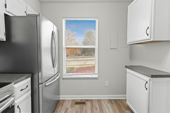 Building Photo - Broad Ripple townhome with garage, updated kitchen, and walkable convenience!