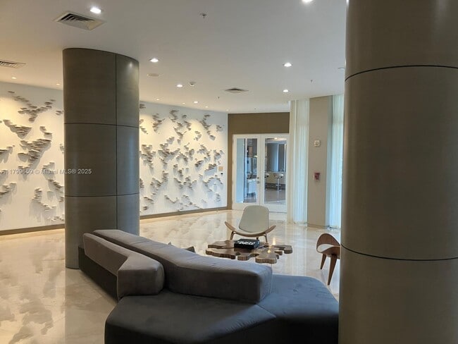 Building Photo - 10275 Collins Ave