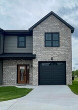 Building Photo - 6711-6715 New Town Ave