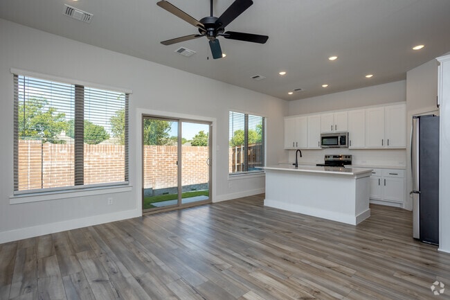 1BR, 1BA - 746SF - Living/Kitchen - Canopy Homes at Woodcreek