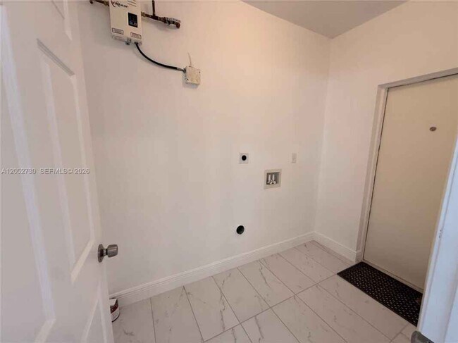 Foto del edificio - 3027 NW 23rd Ave