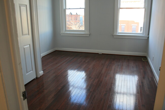 Bedroom with hardwood floor - 1732 Bolton St