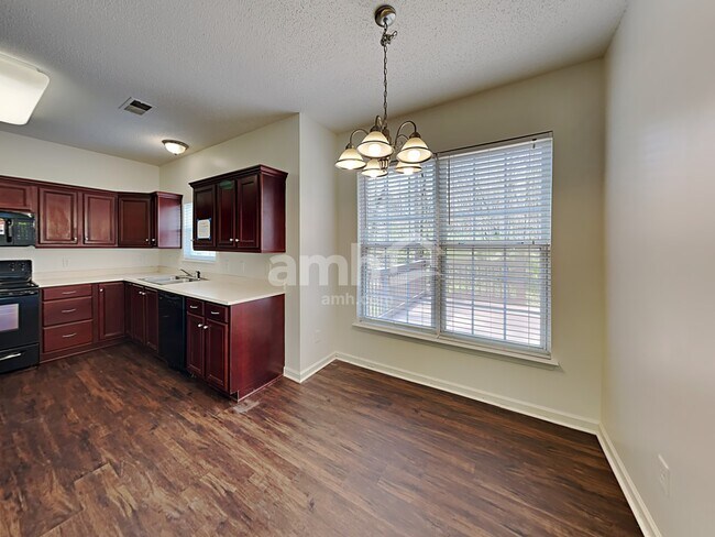 Foto del edificio - 3433 Passour Ridge Ln