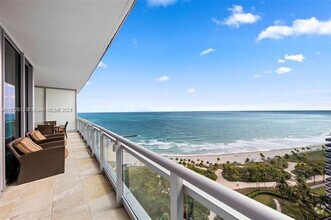 Building Photo - 10295 Collins Ave