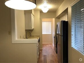 Building Photo - 6907 Woodhue Dr